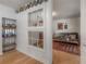 Eclectic living space includes a futon and decoratively framed opening to the next room at 604 W Hilda St, Tampa, FL 33603