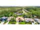 Residential neighborhood showcasing a charming single-story home with lush landscaping and a private backyard at 6716 Frontier Ln, Tampa, FL 33625