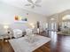 Bright and spacious living room with hardwood floors and vaulted ceilings at 6716 Frontier Ln, Tampa, FL 33625