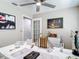 Well-appointed office with a large white desk, decor, stylish art, and a bright atmosphere at 6716 Frontier Ln, Tampa, FL 33625