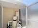 Enclosed pool equipment showing the filter and plumbing with exterior access panel at 6716 Frontier Ln, Tampa, FL 33625