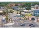 Scenic aerial view of New Port Richey showcasing the vibrant downtown area and lush palm tree-lined streets at 7049 Peninsular Dr, New Port Richey, FL 34652