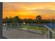 Enjoy the view from this beautiful balcony overlooking the tranquil waterfront, perfect for relaxation and entertainment at 7049 Peninsular Dr, New Port Richey, FL 34652
