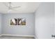Light and airy bedroom with view to the outdoors at 7049 Peninsular Dr, New Port Richey, FL 34652