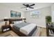 Comfortable bedroom with hardwood floors, ample natural light, and stylish decor, offering a relaxing haven at 7804 N Whittier St, Tampa, FL 33617