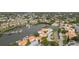 Beautiful waterfront community with boat docks and tennis courts, offering a resort-style living experience at 8707 Sailmaker Ct, Tampa, FL 33615