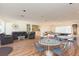 A spacious clubhouse with tables, chairs, sofas, and games at 8707 Sailmaker Ct, Tampa, FL 33615