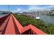Red-railed wooden walkway leading to docks with waterway and community views at 8707 Sailmaker Ct, Tampa, FL 33615