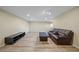 Spacious living room with wood floors, recessed lighting, and comfortable seating area at 8833 Bel Meadow Way, Trinity, FL 34655