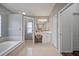 Spacious bathroom featuring large soaking tub at 8833 Bel Meadow Way, Trinity, FL 34655