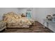 Beautiful main bedroom featuring floral bedding and pool view at 8833 Bel Meadow Way, Trinity, FL 34655