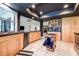 View of the kitchen featuring an island and stainless steel appliances with an eat in dining area at 10 Arbor Ln, Oldsmar, FL 34677