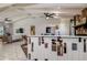 Spacious living room with high ceilings, fireplace, and stylish furnishings at 10 Arbor Ln, Oldsmar, FL 34677
