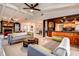 Bright, open-concept living room offering easy access to the kitchen and other living areas at 10 Arbor Ln, Oldsmar, FL 34677