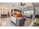 An open living space showcases stylish living room connected to the kitchen at 10 Arbor Ln, Oldsmar, FL 34677