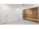 This bedroom has doors and a closet featuring light gray walls and matching floors at 1032 26Th S Ave, St Petersburg, FL 33705