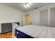 Well-lit bedroom with closet space and an elegant dresser at 10514 52Nd N Ave, St Petersburg, FL 33708