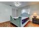 Light bedroom with closet and a stylish blue bed frame at 10514 52Nd N Ave, St Petersburg, FL 33708