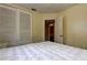 A comfortable bedroom with closet space and connection to the rest of the home at 10514 52Nd N Ave, St Petersburg, FL 33708