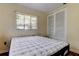 Light filled bedroom with a closet and a sunny window to the backyard at 10514 52Nd N Ave, St Petersburg, FL 33708