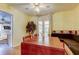 Dining area featuring French doors, built-in bench seating, and an adjacent kitchen at 10514 52Nd N Ave, St Petersburg, FL 33708