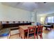 Dining area with bench seating that is open to the living room, perfect for entertaining at 10514 52Nd N Ave, St Petersburg, FL 33708