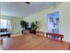 Dining area adjacent to the kitchen, featuring hardwood floors and ample natural light at 10514 52Nd N Ave, St Petersburg, FL 33708