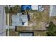 Single-Gathering home features fenced backyard, patio, and mature trees in desirable residential area at 1138 Howard St, Clearwater, FL 33756