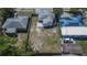 Aerial shot of the expansive backyard featuring a wooden fence enclosing the perimeter of the property at 1138 Howard St, Clearwater, FL 33756