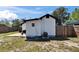 Backyard features a white rock patio area and a well-maintained lawn at 1138 Howard St, Clearwater, FL 33756