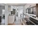 Modern kitchen featuring granite countertops, stainless steel appliances, and plenty of natural light at 1138 Howard St, Clearwater, FL 33756