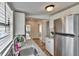 Bright kitchen featuring granite countertops, stainless steel appliances, and white cabinetry at 1138 Howard St, Clearwater, FL 33756