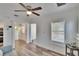 Bright living room with connections to the other parts of the house, showcasing a seamless flow and layout at 1138 Howard St, Clearwater, FL 33756