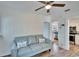 Living room view showcasing the open layout, light walls, and seamless transition into the adjacent kitchen at 1138 Howard St, Clearwater, FL 33756