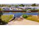 Waterfront community with boat launch, canal access, and well-maintained landscaping at 128 E Saint Johns Way, Apollo Beach, FL 33572