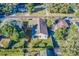 Aerial view of the property shows the house's layout, yard, and neighborhood at 1313 E Cayuga St, Tampa, FL 33603