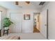 This bedroom features neutral carpet and paint, a plant, and a closet at 1313 E Cayuga St, Tampa, FL 33603