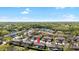 Aerial view highlights community with lake views and convenient access to nearby amenities at 14019 Notreville Way, Tampa, FL 33624