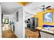 Open concept dining area offering great view to kitchen with stainless steel appliances at 14019 Notreville Way, Tampa, FL 33624