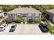 Well-maintained two-story condo with ample parking and inviting landscaping at 14019 Notreville Way, Tampa, FL 33624