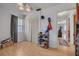 Another bedroom view showcasing wood laminate flooring, and convenient closet storage with easy access at 1541 68Th N Ave, St Petersburg, FL 33702