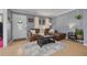 Bright living room with ample natural light, a cozy sofa, and stylish accents at 1541 68Th N Ave, St Petersburg, FL 33702