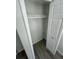 Walk-in closet with a single shelf running the width of the closet at 1574 Ewing Ave, Clearwater, FL 33756