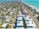 Aerial view of homes near the beach, highlighting the proximity to pristine shores and oceanfront living at 16306 1St E St, Redington Beach, FL 33708