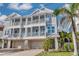 Elegant condo with private balconies, garage, and well-maintained landscaping at 16306 1St E St, Redington Beach, FL 33708