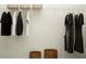 Walk-in closet featuring hanging clothes, wire shelving, and basket storage offering efficient organization at 17560 Happytrails St, Land O Lakes, FL 34638