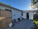 Backyard with string lights, a patio, a storage shed, and space for outdoor activities at 1883 Michigan Ave Ne, St Petersburg, FL 33703