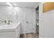 Clean bathroom features modern vanity and fixtures, plus a closet for storage at 1998 Blue Hawk Ct # 1613, Clearwater, FL 33762