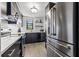 Modern kitchen featuring stainless steel appliances and stylish design elements at 1998 Blue Hawk Ct # 1613, Clearwater, FL 33762