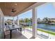 Spacious covered outdoor dining area featuring a beautiful waterfront view at 2050 Hawaii Ne Ave, St Petersburg, FL 33703